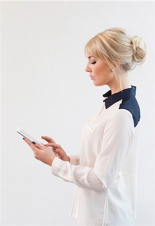sweden woman business - Young businesswoman with digital tablet Photographie de stock - Premium Libres de Droits, Code: 6102-07768853