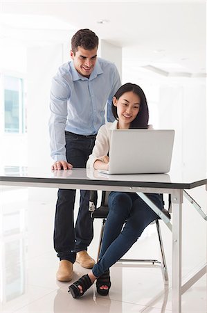 professional on laptop - People in office Stock Photo - Premium Royalty-Free, Code: 6102-07768907