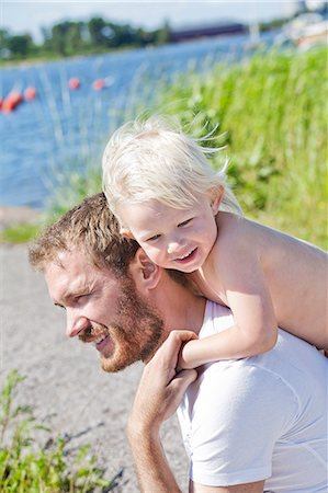 family gathering, holiday - Man with young son Stock Photo - Premium Royalty-Free, Code: 6102-07769093