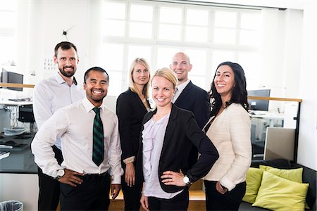 simsearch:6102-07769345,k - Business people in office Stock Photo - Premium Royalty-Free, Code: 6102-07769329