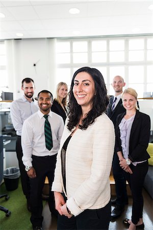simsearch:6102-07769345,k - Business people in office Stock Photo - Premium Royalty-Free, Code: 6102-07769333