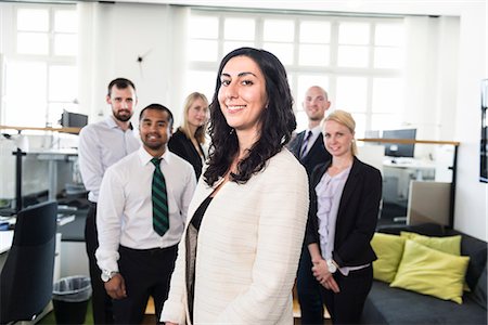 simsearch:6102-07769345,k - Business people in office Stock Photo - Premium Royalty-Free, Code: 6102-07769332