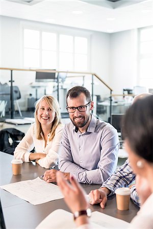 Business people at meeting Stock Photo - Premium Royalty-Free, Code: 6102-07769336