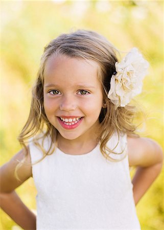 Portrait of smiling girl Stock Photo - Premium Royalty-Free, Code: 6102-07769461