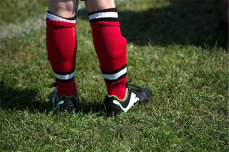 Legs of soccer player, Orebro, Sweden Stock Photo - Premium Royalty-Free, Code: 6102-07789503