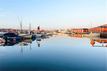 Boats moored at harbor, Vastkusten, Sweden Stock Photo - Premium Royalty-Free, Code: 6102-07789526