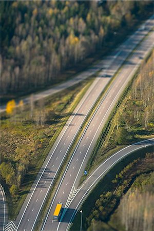 simsearch:6102-08120886,k - Aerial view of road going through forest Stockbilder - Premium RF Lizenzfrei, Bildnummer: 6102-07789781