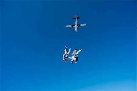 Skydivers in air Stock Photo - Premium Royalty-Free, Code: 6102-07789816