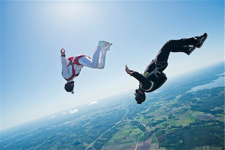 sky diving - Skydivers in air Stock Photo - Premium Royalty-Free, Code: 6102-07789821