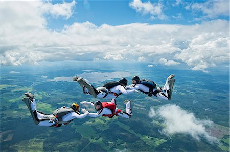 skydiving - Skydivers in air Stock Photo - Premium Royalty-Free, Code: 6102-07789825