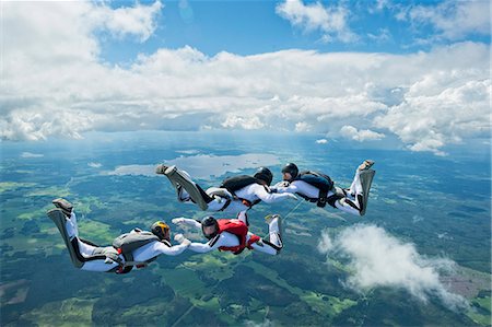 simsearch:400-06099362,k - Skydivers in air Stock Photo - Premium Royalty-Free, Code: 6102-07789825