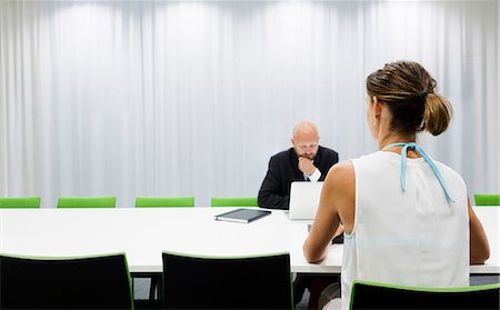 simsearch:6102-07602614,k - Man and woman at business meeting Stock Photo - Premium Royalty-Free, Code: 6102-07842663