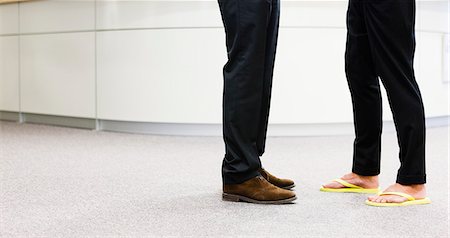 flips flops - Two businessmen meeting, low section Stock Photo - Premium Royalty-Free, Code: 6102-07842676