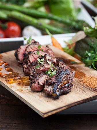 simsearch:6102-08062881,k - Grilled meat with herbs Foto de stock - Sin royalties Premium, Código: 6102-07842885