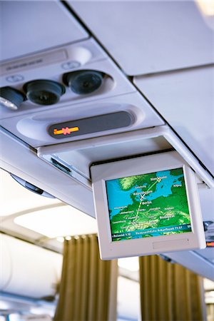 simsearch:6102-07843505,k - Screen in airplane Stock Photo - Premium Royalty-Free, Code: 6102-07842931