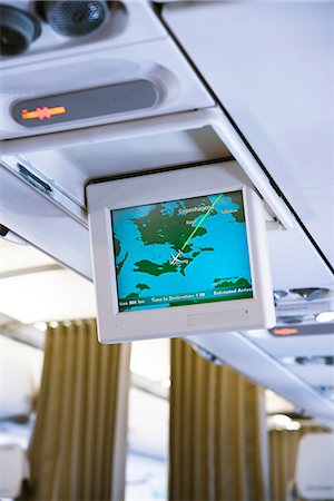 simsearch:6102-07843505,k - Screen in airplane Stock Photo - Premium Royalty-Free, Code: 6102-07842932