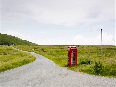 red call box - Telephone booth on side of country road Stock Photo - Premium Royalty-Free, Code: 6102-07843012