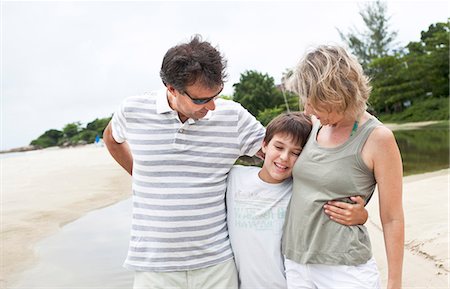 Parents with son on beach Stock Photo - Premium Royalty-Free, Code: 6102-07843323