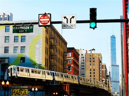 street sign and chicago - Low angle view of subway train Stock Photo - Premium Royalty-Free, Code: 6102-07843560