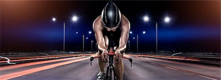 sports helmet - Woman cycling at night Stock Photo - Premium Royalty-Free, Code: 6102-07843623