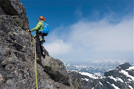 escalade de montagne - Man climbing Photographie de stock - Premium Libres de Droits, Code: 6102-07843979