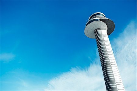 simsearch:6102-08168980,k - Low angle view of air traffic control tower Stock Photo - Premium Royalty-Free, Code: 6102-07843997