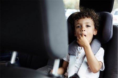 Boy sitting in car Stock Photo - Premium Royalty-Free, Code: 6102-07844130