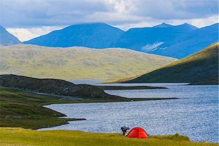 Hiker in mountains Photographie de stock - Premium Libres de Droits, Code: 6102-07844299