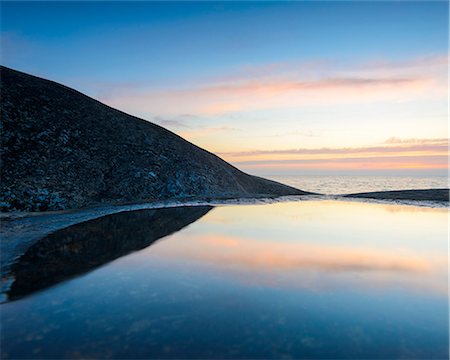 simsearch:6102-08995194,k - Cliff reflecting in puddle at sunset, Vastkusten, Sweden Foto de stock - Sin royalties Premium, Código: 6102-08062863