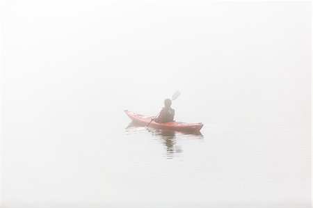 simsearch:6102-08062947,k - Person kayaking in fog Stock Photo - Premium Royalty-Free, Code: 6102-08062945