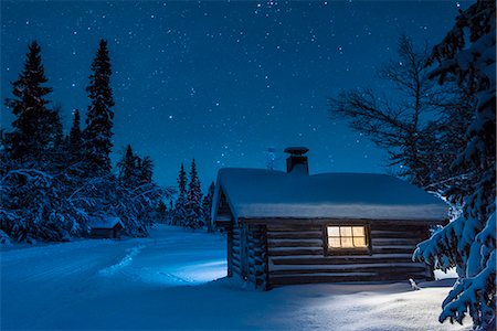 simsearch:6102-08270859,k - Illuminated log house at night Stock Photo - Premium Royalty-Free, Code: 6102-08063001