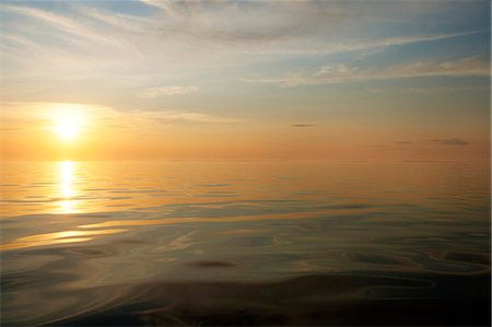 simsearch:6102-08000559,k - Sunset at sea Stock Photo - Premium Royalty-Free, Code: 6102-08000560