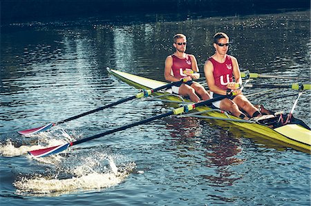 sunglasses boat - Young men canoeing Stock Photo - Premium Royalty-Free, Code: 6102-08000682