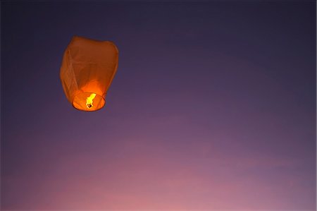 Paper lantern against sky Stock Photo - Premium Royalty-Free, Code: 6102-08000819