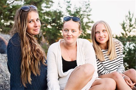 Teenage girls looking at camera Stock Photo - Premium Royalty-Free, Code: 6102-08000972