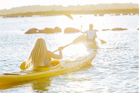 paddling water - Women kayaking at evening Foto de stock - Sin royalties Premium, Código: 6102-08000905