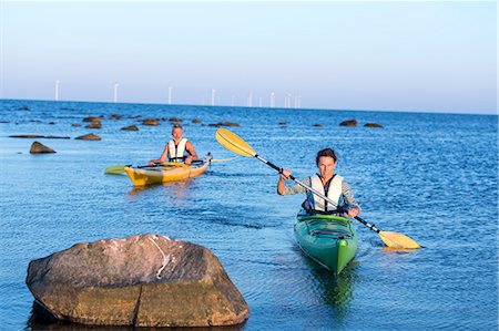 sea kayak - Man and woman kayaking Stock Photo - Premium Royalty-Free, Code: 6102-08000906
