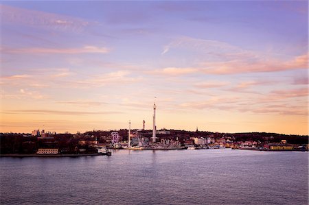 stockholm grona lund - Buildings at sea, dusk Stock Photo - Premium Royalty-Free, Code: 6102-08001386