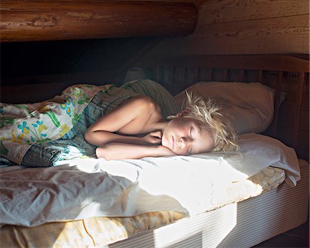 sleeping on bed - Girl sleeping Stock Photo - Premium Royalty-Free, Code: 6102-08001463