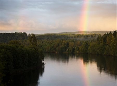 Rainbow above lake Stock Photo - Premium Royalty-Free, Code: 6102-08168971