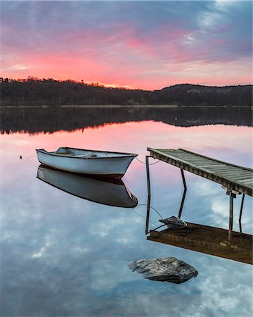 dock, not person - Rowboat moored at jetty, sunset Stock Photo - Premium Royalty-Free, Code: 6102-08169076