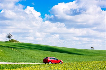 simsearch:6102-07844099,k - Red car on country road Stock Photo - Premium Royalty-Free, Code: 6102-08183956