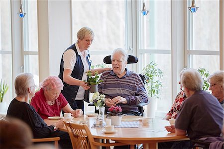 pictures of 70 year old - Senior people having coffee in care home Stock Photo - Premium Royalty-Free, Code: 6102-08184218