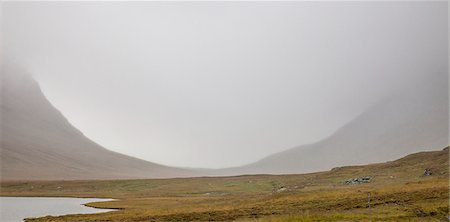 foggy mountain lake - Mountains in fog Stock Photo - Premium Royalty-Free, Code: 6102-08120236