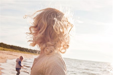 Child looking at sea Stock Photo - Premium Royalty-Free, Code: 6102-08120469