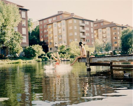 simsearch:6102-08063042,k - Couple having a swim Stock Photo - Premium Royalty-Free, Code: 6102-08120971