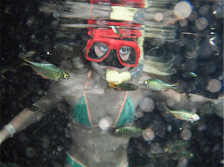 person underwater looking up - Girl snorkeling Stock Photo - Premium Royalty-Free, Code: 6102-08270688