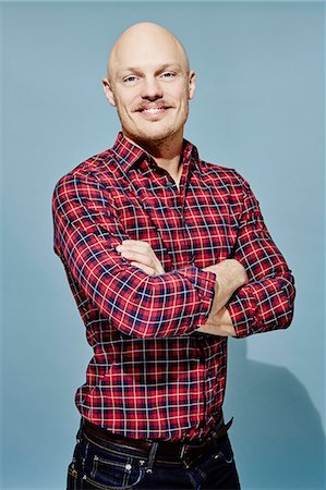 dégarni - Portrait of man wearing checked shirt Photographie de stock - Premium Libres de Droits, Code: 6102-08271498