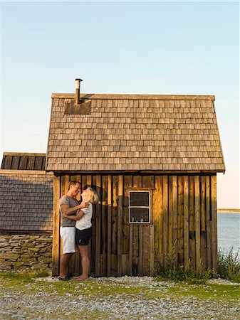 simsearch:6102-03827498,k - Happy couple near wooden house Photographie de stock - Premium Libres de Droits, Code: 6102-08271759