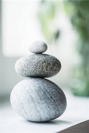 Stack of pebbles Photographie de stock - Premium Libres de Droits, Code: 6102-08271788